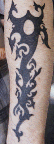 tribal forearm tattoo